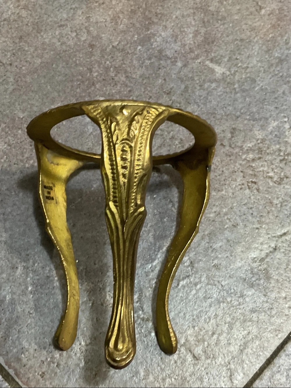 Brass candle holder with glass